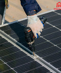 Installing 20 Piece Aluminum Solar Panel Clamps For Unistrut Mounting System on rooftop with drill