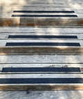 Heavy Duty Anti Slip Tape 2 Inch Wide By 35 Feet Long With 80 Grit Traction For Indoor Outdoor Stairs Waterproof Non Skid Tread Tough Grip For Steps Black applied on wooden stairs outdoors