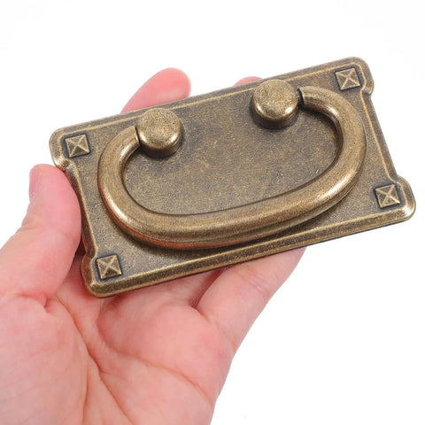 Hand holding Four Pack Vintage Drawer Pull Handles For Cabinets, Dressers, Wardrobes, And Vanities, Dope Retro Cabinet Hardware
