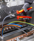 StepCut XL Cable Shears 1000V Insulated 9 Inch Beefy High Leverage Cable Cutters trimming power wires in electrical setup.
