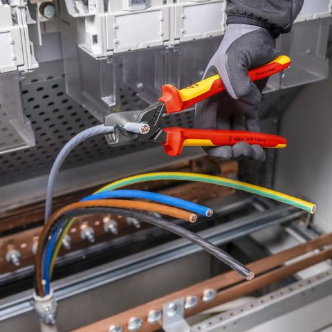 StepCut XL Cable Shears 1000V Insulated 9 Inch Beefy High Leverage Cable Cutters trimming power wires in electrical setup.
