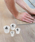 Person marking wood next to Dowel Center Transfer Plugs Set Handy Steel Tenon Center Pins For Woodworking Accurate Marking And Alignment