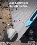 Surface of Beast 100W Foldable Portable Solar Panel Charger With Adjustable Kickstand IP67 Waterproof shown on rocky ground with durability icons.