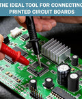 Hands using probes on a printed circuit board with various electronic components, showing use for 395 Pack Black Nylon Spacer Kit For PCB Standoffs And Electronics Mounting Non Threaded Round Spacers For Circuit Boards Switches Receptacles And Other Hardware Go-To Quick Mounts.