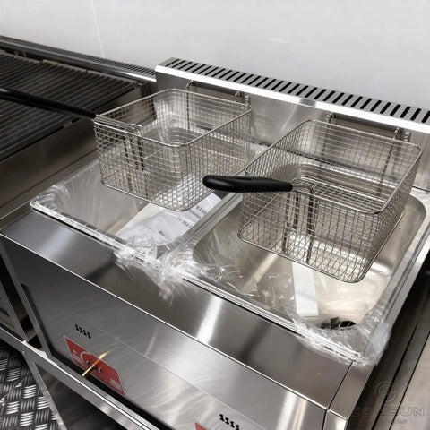 Commercial Grade Coffee Trailer And Mobile Hot Dog Cart Featuring Chef Ready Full Kitchen Setup With Plug And Play Wiring To Help You Crush Sales At Street Events - stainless steel fryer with wire baskets.