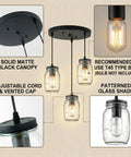 Industrial Mason Jar Pendant Lights for Kitchen Island with solid matte black canopy and adjustable cords.