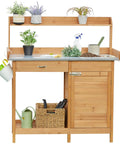 Outdoor Garden Potting Bench With Wood Tabletop And Open Shelf Cabinet Drawer Dope Fir Wood Workstation For Potting Plants Herbs Veggies And DIY Garden Projects with plants and tools