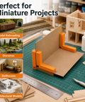 Magnetic Right Angle Clamps For Miniatures And Dioramas, Pro Grade Tool For 90 Degree Corners In Model Railroading And Architectural Modeling, Built For Hobbyists Who Demand Realistic, Flawless Corners. Magnetic clamp holding cardboard wall at 90 degrees on a cutting mat.