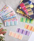 Writable Sticky Tabs Set With 80 Color Varieties, 16000 Index Tabs for annotating books and planners, arranged on table