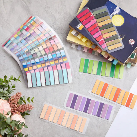 Writable Sticky Tabs Set With 80 Color Varieties, 16000 Index Tabs for annotating books and planners, arranged on table