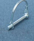 Beefy Heavy Duty Trailer Coupler Pin Pack Of 4 Zinc Plated Carbon Steel Hitch Pin Safety Locking Pins One Quarter Inch By Two Point Sixteen Inches Rust Resistant And Ready For Real World Towing. Single pin with zinc finish on fabric backdrop.