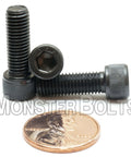 Heavy Duty Quarter Inch 28 Threads Per Inch Socket Head Cap Screws Three Quarter Inch Long Alloy Steel With Black Oxide Finish ASTM A574 Ten Pack For Tough Assemblies And Quick Fixes, shown next to a coin for size.