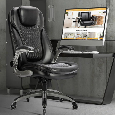 Ergonomic Executive Office Chair For Home And Desk, High Back Leather Swivel Chair With Padded Flip Up Armrests, Black in office setting.
