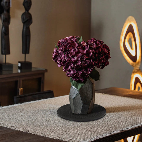 Slick 10 Inch Heavy Duty Swivel Base With A Slim Zero Point Eight Inch Profile And Rock Solid One Hundred Pound Support For Smooth 360 Degree Spin On Any Desk Or Counter For Monitors Plants And Everyday Tech Gear with purple flowers in geometric vase on table.