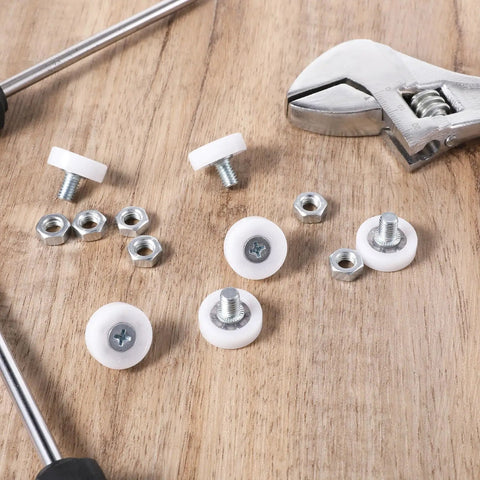 Six Piece Set Of 19mm White Plastic Drawer Rollers Featuring Slick Cabinet Pulleys For Smooth Operator Furniture Gliding No Sweat Replacement Wheels With Heavy Duty Mounting Nuts, showing white plastic rollers and mounting nuts.