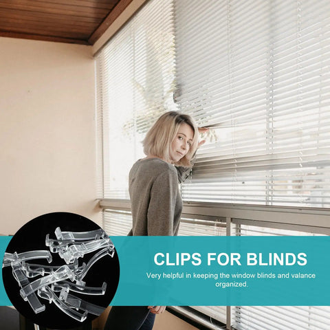 Thirty Piece Set Of Transparent Valance Clips For Window Blinds 2.5 Inch Hidden Track Holders on a window.
