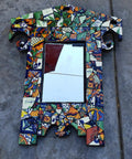 Decorative mirror framed with 10 Pound Bundle of Broken Mexican Talavera Tiles for Mosaic Projects and DIY Decor, handcrafted colorful tile shards.