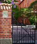 Aluminum Door Sign 9x3 Inches Self Adhesive Waterproof Office Sign For Authorized Personnel Only on a black iron gate