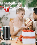 One Touch Electric Coffee Grinder For Beans, Spices, Herbs And Seeds with gift boxes on a table, 50g capacity, compact black design.