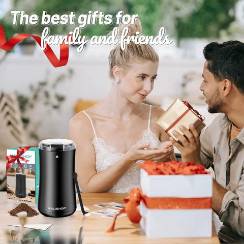 One Touch Electric Coffee Grinder For Beans, Spices, Herbs And Seeds with gift boxes on a table, 50g capacity, compact black design.