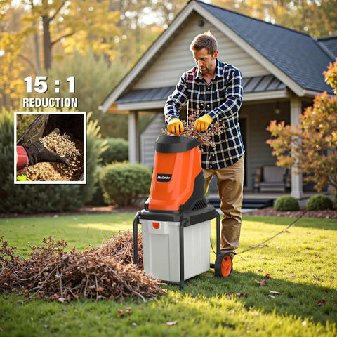 Person using Powerful 15-Amp Wood Chipper Shredder With 50L Collection Bin Mulches Up To 1.8-Inch Branches For Quick Yard Cleanup