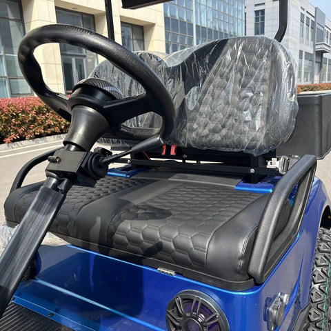 Heavy Duty Electric Golf Cart With Four Kilowatt Motor And Easy Directional Controls two-seat cockpit with steering wheel and textured seats.