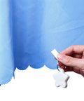 Hand clipping Starfish Tablecloth Weights Set With Metal Clips to blue tablecloth for outdoor picnics, keeping linens flat.