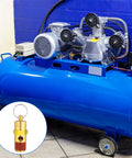 Blue portable air compressor with belt-driven pump; inset shows brass 1/4 inch male pressure relief valve.