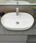 White Ceramic Vessel Sink With Faucet And Pop Up Drain Oval Above Counter Bathroom Vanity Basin Durable Porcelain Minimalist Modern Design For Homes Easy Install Sleek Dope Look For Powder Rooms