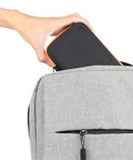 Person placing Hard Carrying Case Replacement for WORX WX081L WX082L ZipSnip into backpack, showcasing portability.