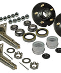 Pair Of 5 Bolt 4 1 2 Inch Trailer Hub Assembly With Flanged Tapered Spindles And Premium Bearing Setup laid out with components.