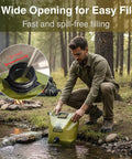 Person filling Two Gallon Collapsible Water Container With Spout For Camping And Outdoors from stream, focus on spout size