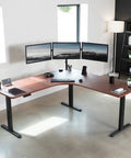 VIVO Corner Standing Desk In Dark Walnut L Shaped Electric Height Adjustable Workstation With Monitor Mount, 71 inch dual screen setup.