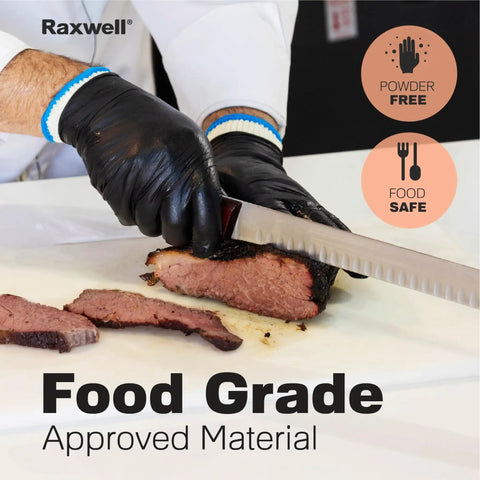 Gloved hands slicing meat wearing Dual Layer Heat Defense BBQ Gloves For Grilling And Cooking Non Slip Nitrile Grip Ambidextrous Oven Mitts