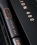 Fusion 480 Hair Straightener with High Heat Power, sleek black design, professional tourmaline ceramic plates visible.