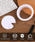 Two Pack White Desk Cable Grommets Sixty Millimeter Abs Plastic Cord Hole Inserts Featuring Spring Loaded Bases and No Sweat Detachable Caps on desk.