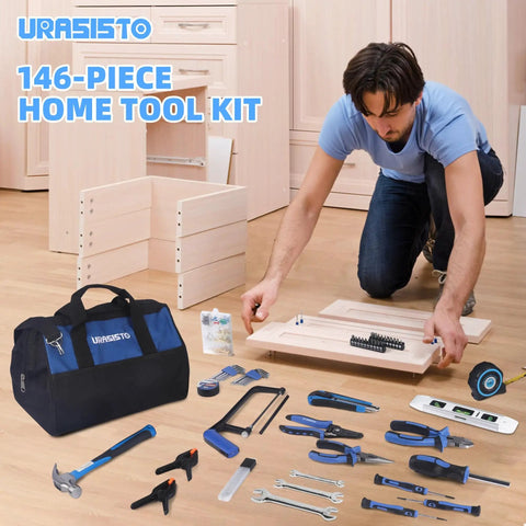 Man assembling wooden furniture with 174 Piece Go-To Home Repair Tool Kit With 14 Inch Large Mouth Storage Tool Bag visible on floor.