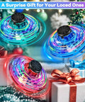 Three LED flying toys for kids next to gift boxes, Kids Drone Flying Toy For Indoor And Outdoor Fun, 2026 Upgraded LED Fidget Spinner