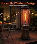 Gas Patio Heater With Wheels, Floor Standing Outdoor Heater With Round Dancing Flame And Glass Tube, Quick No Tool Setup Under Five Minutes, 20 Lb Propane Tank Compatible For Balcony Veranda And BBQ Party displayed on patio