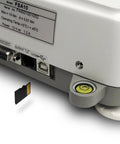 Cap Torque Gauge With NIST Traceable Certificate 100 Lbf Inch And 0.1 Lbf Inch High Res Clockwise And Counter Clockwise Testing Built In Wireless Data Capture USB RS232 MicroSD Seven Inch Diameter Sample 1000 Hz Readouts rear USB RS232C ports, microSD slot, and level on white housing