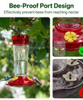 2 Pack 14 Ounce Plastic Hummingbird Feeders With Ant Moat And Bee Guard For Outdoors, Four Feeding Ports, hanging from tree