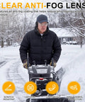 Heavy Duty 36 Pack ANSI Z87.1 Safety Glasses Featuring Side Shields And Anti Scratch Coating Delivering Badass Eye Protection For Tough Jobs And Sweet Day To Day Runs For Men And Women worn by man using a snowblower in snowy environment.