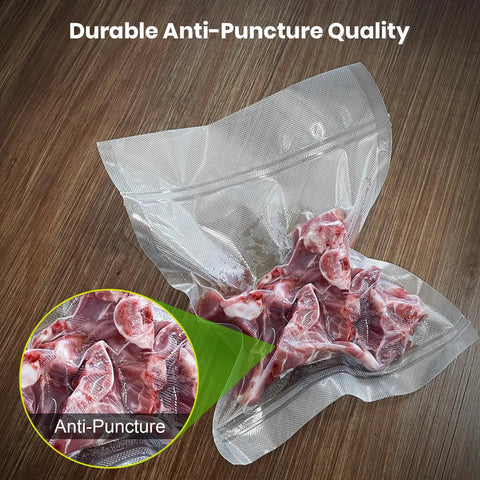 Durable anti-puncture vacuum sealer bags with meat inside, part of the Vacuum Sealer Bags 2 Pack 11x20 Rolls BPA-Free Heavy-Duty