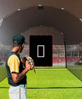 Person pitching in front of Baseball Softball Batting Cage Backstop With 4 By 6 Foot Strike Zone Target Cloth For Backyard Practice