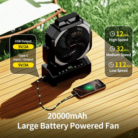 Camping Fan With Light 20000mAh Rechargeable Battery, Remote Control, digital display charging a phone on a wooden surface