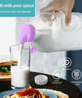 Pouring milk from 64 Oz Heavy Duty Glass Milk Bottle With Airtight Screw Cap Reusable One Half Gallon Water Bottle With Scale Lines