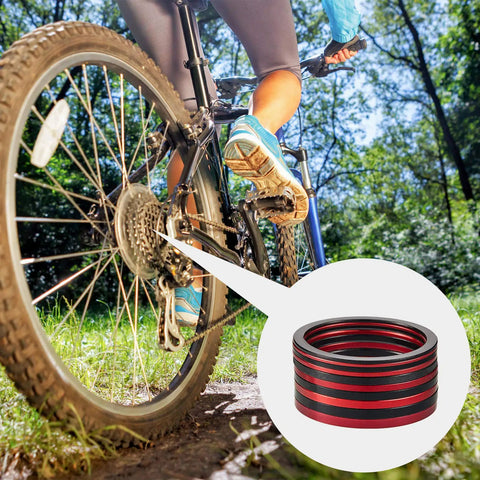 Aluminum Bike Cassette Spacers And Hub Washers Set For 7 To 11 Speed, 1mm To 3.0mm Thick, shown on a bike in use outdoors.