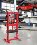 Heavy Duty 6 Ton H Frame Hydraulic Shop Press With Adjustable Table And Stamping Plates in automotive workshop setting.