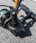 Close-up of 6 Ft 6 In Max SX Spinning Rod And Reel Combo Size 3000 with 7 stainless steel ball bearings on a boat deck
