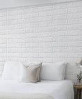 White 3D Faux Brick Wallpaper Peel And Stick Panels For Easy DIY Home Makeover Waterproof Foam Brick Wall Decor in bedroom setting